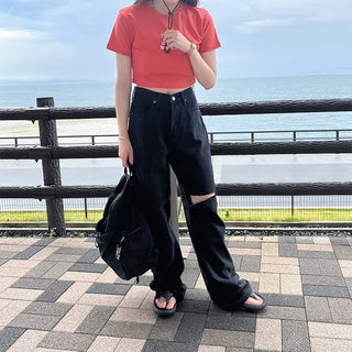 Distressed black denim pants