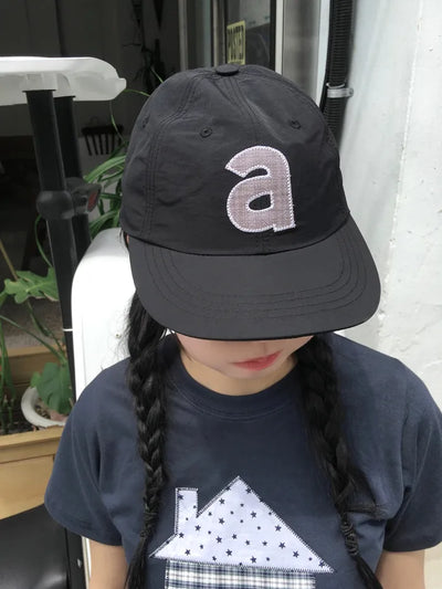 Dot Alphabet Cap