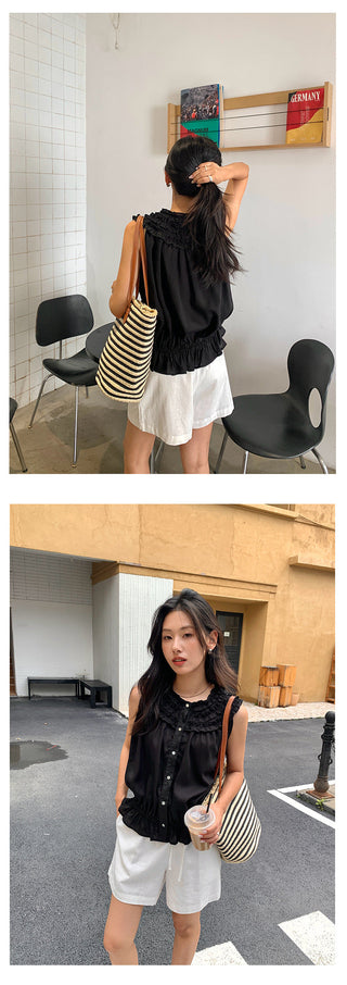 pleated sleeveless shirt