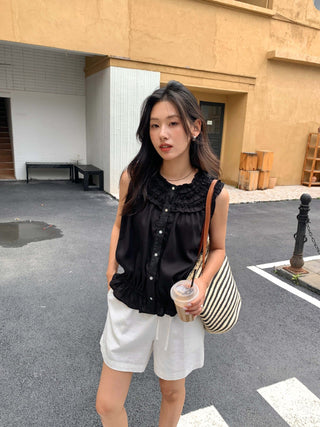 pleated sleeveless shirt