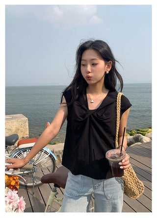 cross sleeveless top