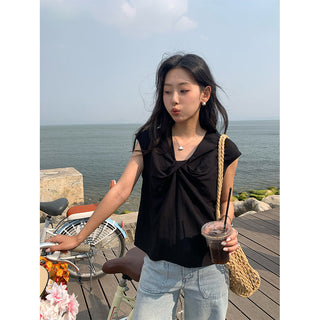 cross sleeveless top