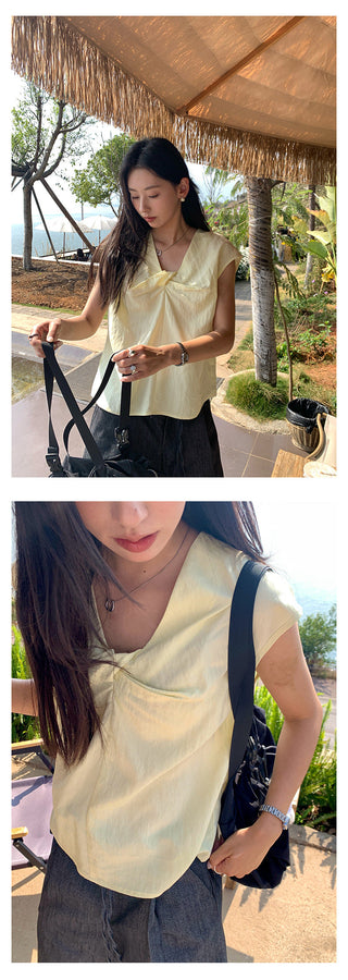cross sleeveless top