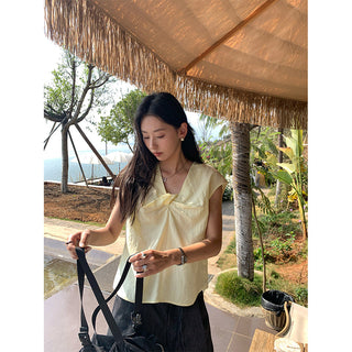 cross sleeveless top