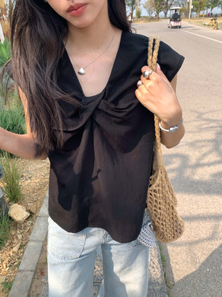 cross sleeveless top