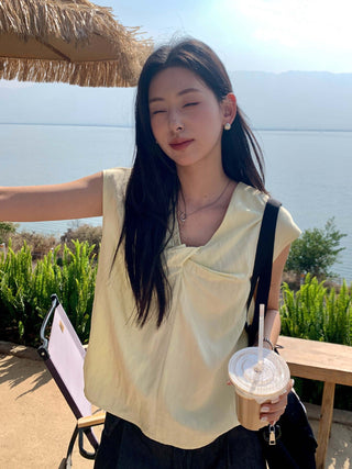 cross sleeveless top