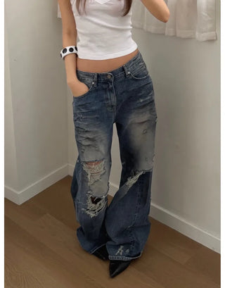 VINTAGE DESTROYED JEANS