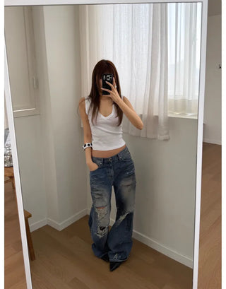 VINTAGE DESTROYED JEANS