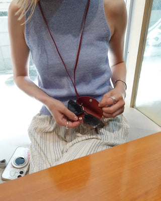 Half-moon leather eyeglass holder