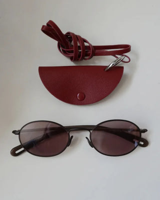 Half-moon leather eyeglass holder
