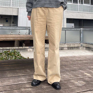 Brushed-back cotton pleated pants