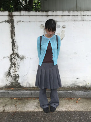 Mid-length pleated skort