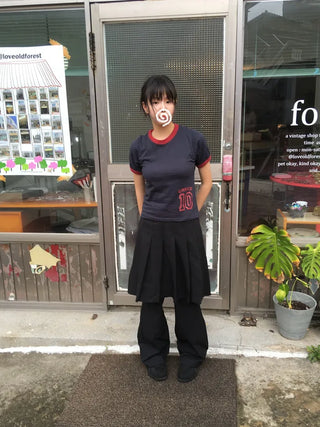 Mid-length pleated skort