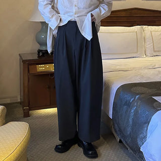 Wide-leg slacks with double pleats
