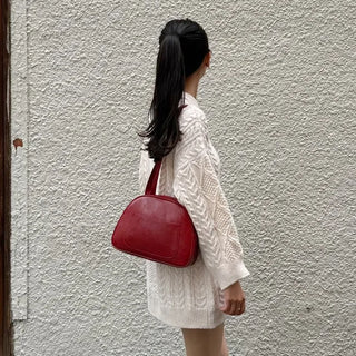 Half-round shoulder bag