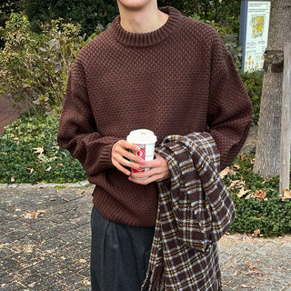 Round punched knit sweater