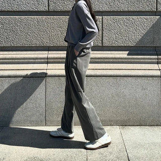 Striped pleated wide slacks