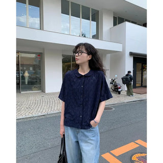 Perforated blouse