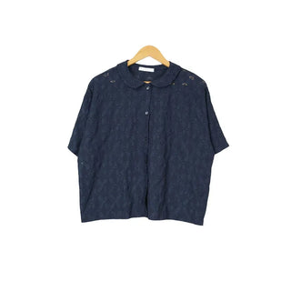 Perforated blouse