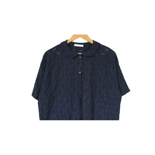 Perforated blouse