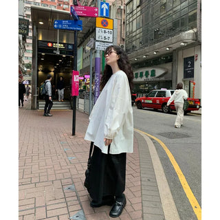 Oversized slit puff blouse