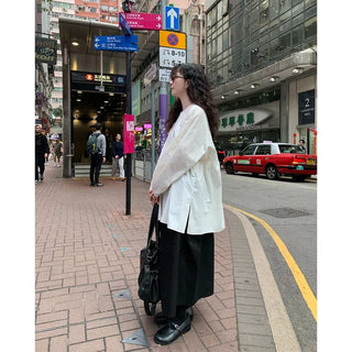 Oversized slit puff blouse