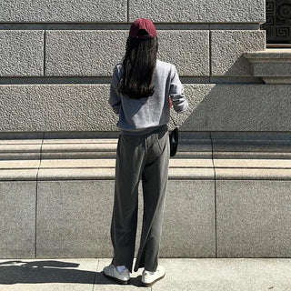 Striped pleated wide slacks