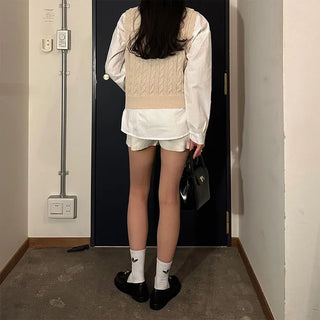 Twist V-neck knit vest
