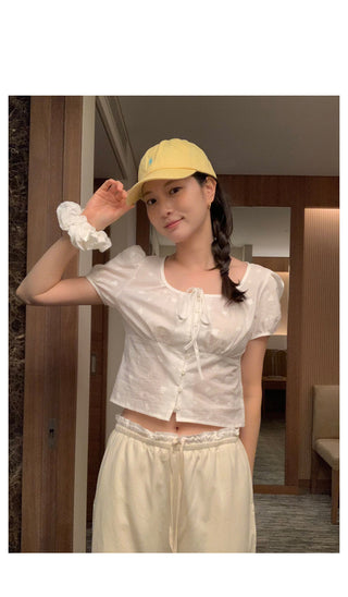 U-neck puff button blouse