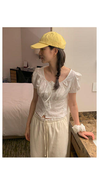U-neck puff button blouse