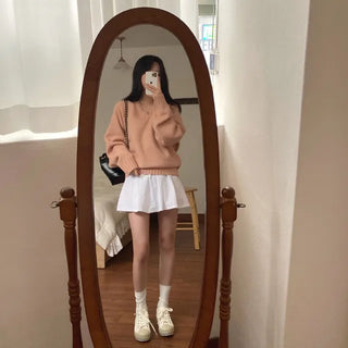 Loose-fit raglan pink V-neck knit