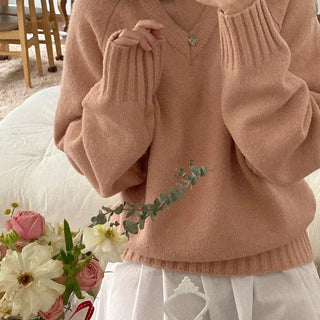 Loose-fit raglan pink V-neck knit
