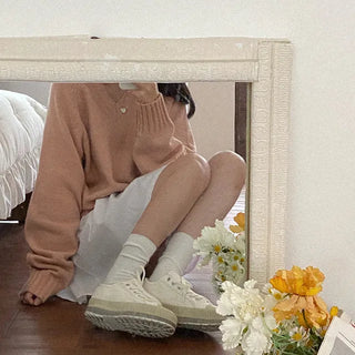 Loose-fit raglan pink V-neck knit