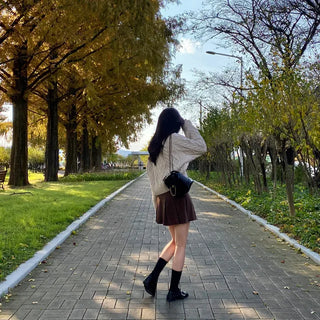 Oversized puff twist round long-sleeve knit cardigan
