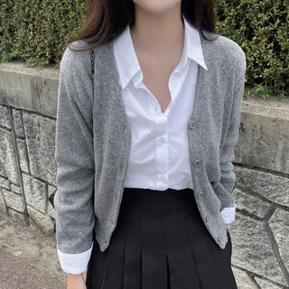 Loose-fitting cotton white semi-cropped shirt