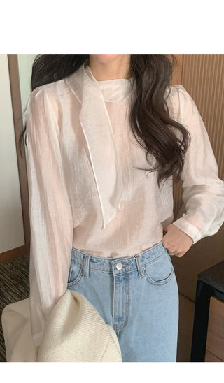 Sheer blouse with tie