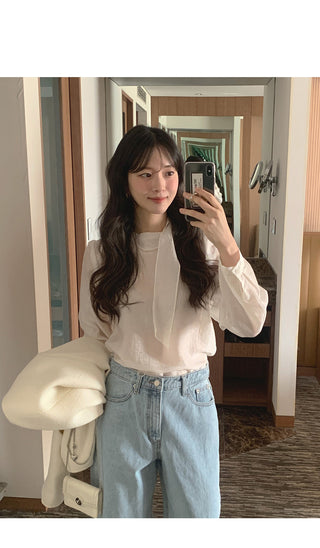 Sheer blouse with tie