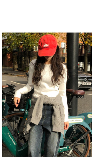 Peach-colored brushed-back T-shirt