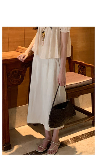 See-through sleeveless blouse