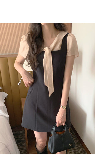 Short-sleeved blouse with tie