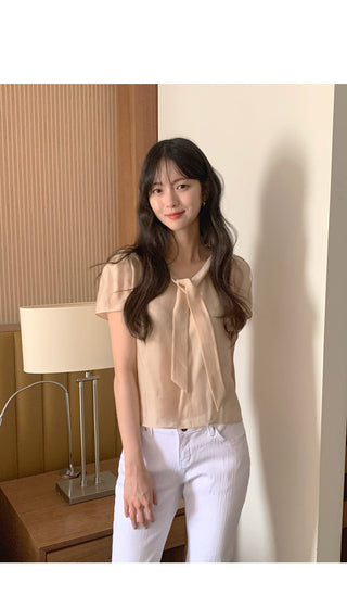 Short-sleeved blouse with tie
