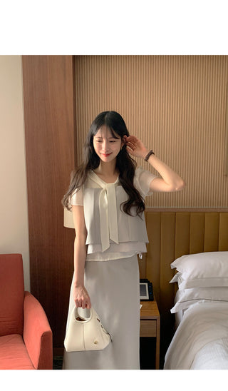 Short-sleeved blouse with tie