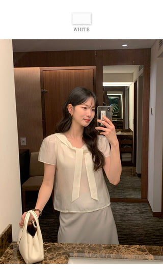 Short-sleeved blouse with tie