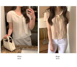 Short-sleeved blouse with tie