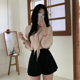 Tie-detail ribbon puff sleeve V-neck blouse