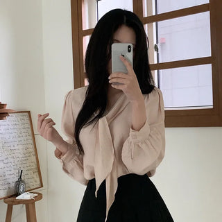 Tie-detail ribbon puff sleeve V-neck blouse