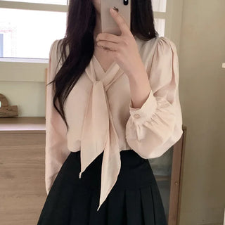 Tie-detail ribbon puff sleeve V-neck blouse