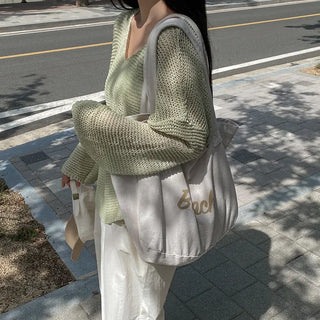 Off-shoulder oversized sheer V-neck
