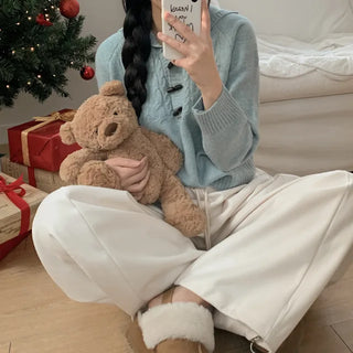 Hooded wool cable knit sweater