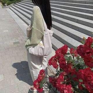 Off-shoulder oversized sheer V-neck